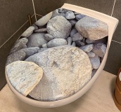 WC Deckel Steine